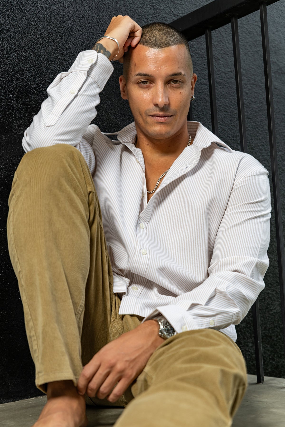 White linen shirt with khaki trousers